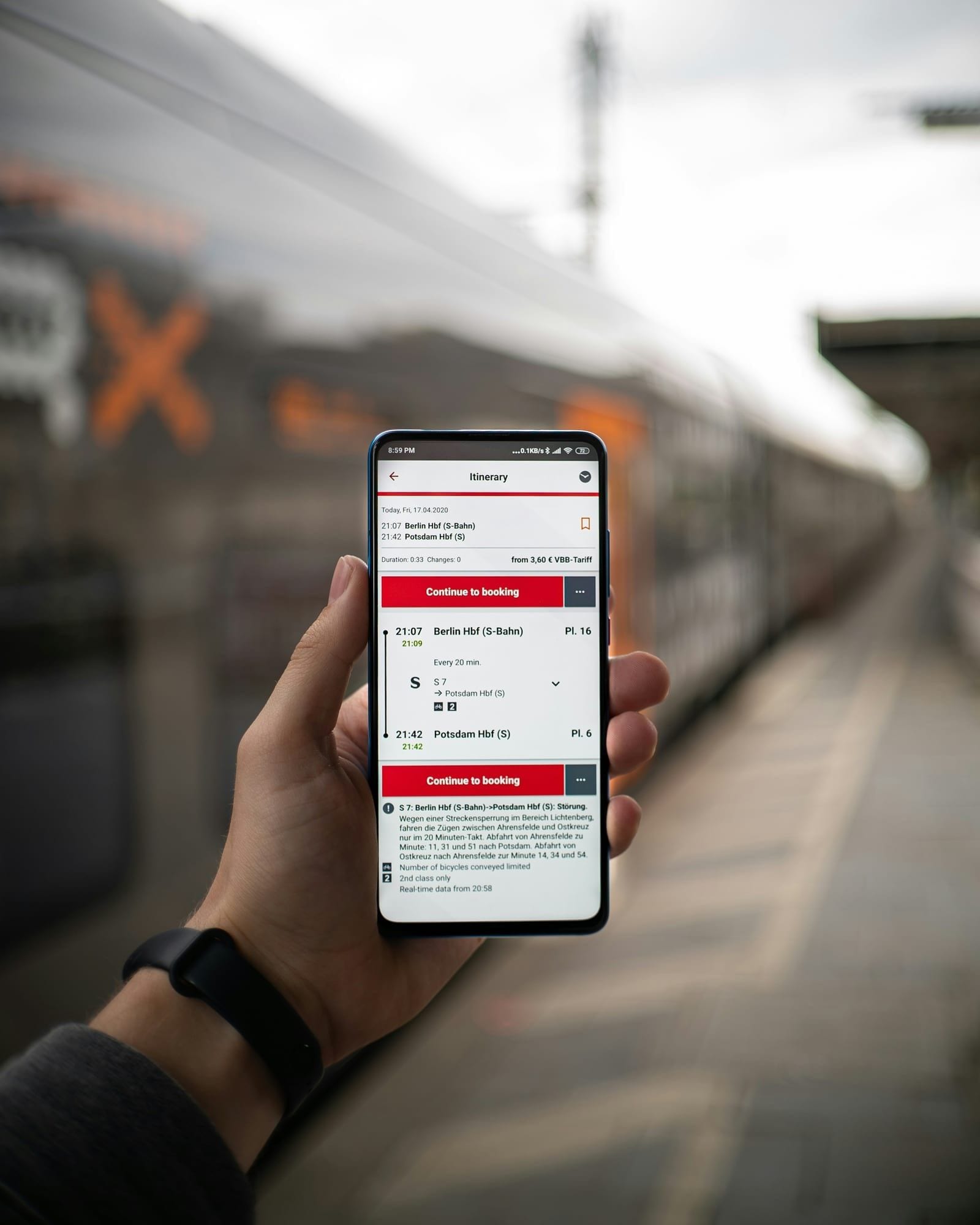 Traveler comparing hotels on a phone
